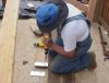 Charlie getting ready to connect two pieces of ridge pole together. 
