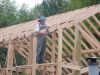 Charlie trimming the rafters off at 90 degrees to the ground. 