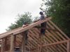 Putting waferboard on the roof. 