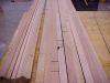 Strips of wood ready to be glued together to form the center column for the spiral staircase. 