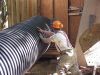 Rolling the well casing into position. 