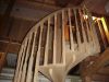 Staircase held upright in the new add-on by ropes. 