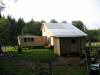 Completed from another angle. The extra building is a pump house. 