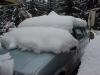 This is the snow-covered van. It doesn't look like it will be leaving home for a while. 
