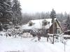 The house with snow on it. That's the beginning of the igloo in the front yard. 