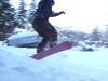 Matthew tried out his snowboard. Here he's pictured in the air after going over a jump. 