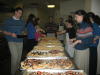 I got to help out in the kitchen today. We made tons of pizza. 
