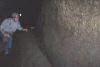 The cave ends at a 12 foot wall with this cool scroll at the bottom. 