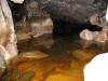 Another view of the lake in a new, un-named erosional cave. We were unable to follow the main passage at this point because the lake complete filled it, but we did find a crawl off to the side around the lake. 